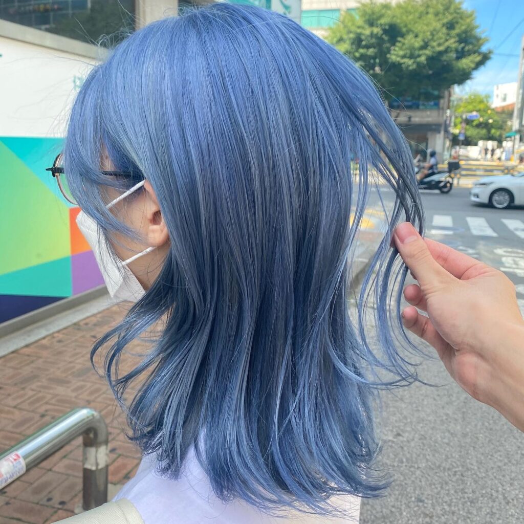 Daring Transformation: Bleached Ash Blue Color at Seoul Hair Salon 1 woman ash blue hair